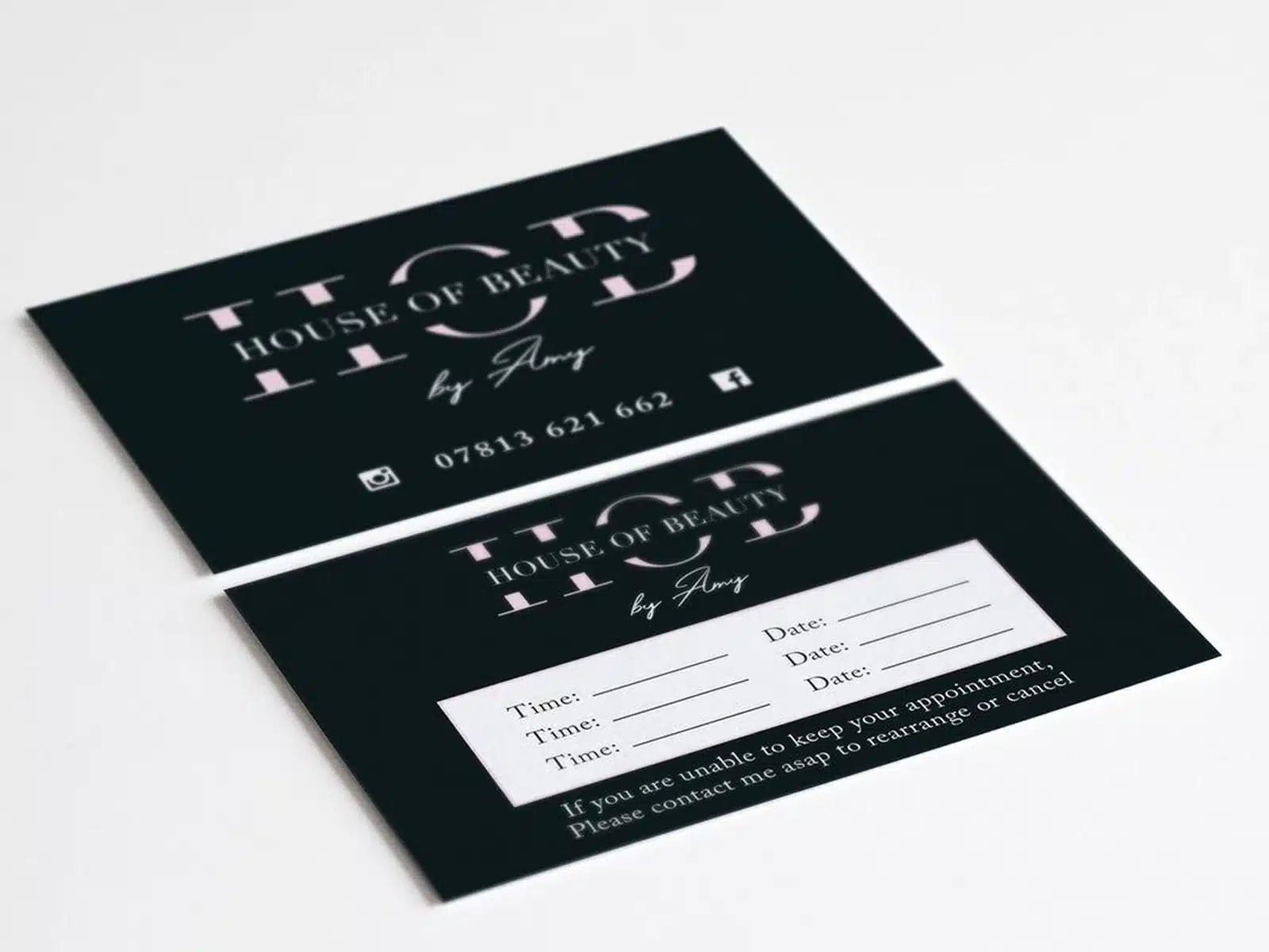 Black business cards for a beauty salon