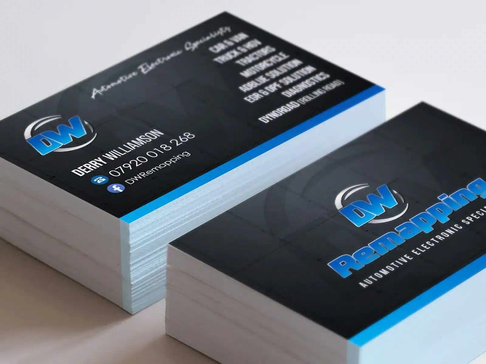 Printed business cards in blue and black