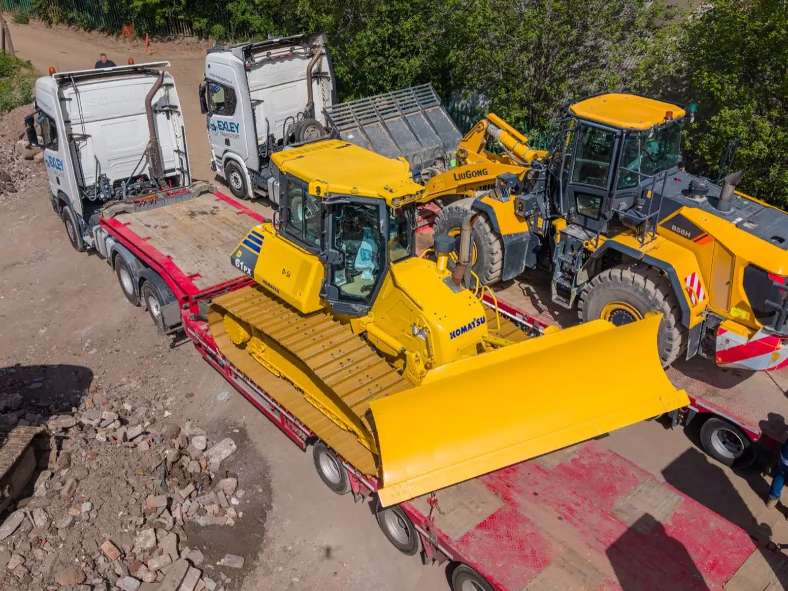 Low loader loaded with plant machinery
