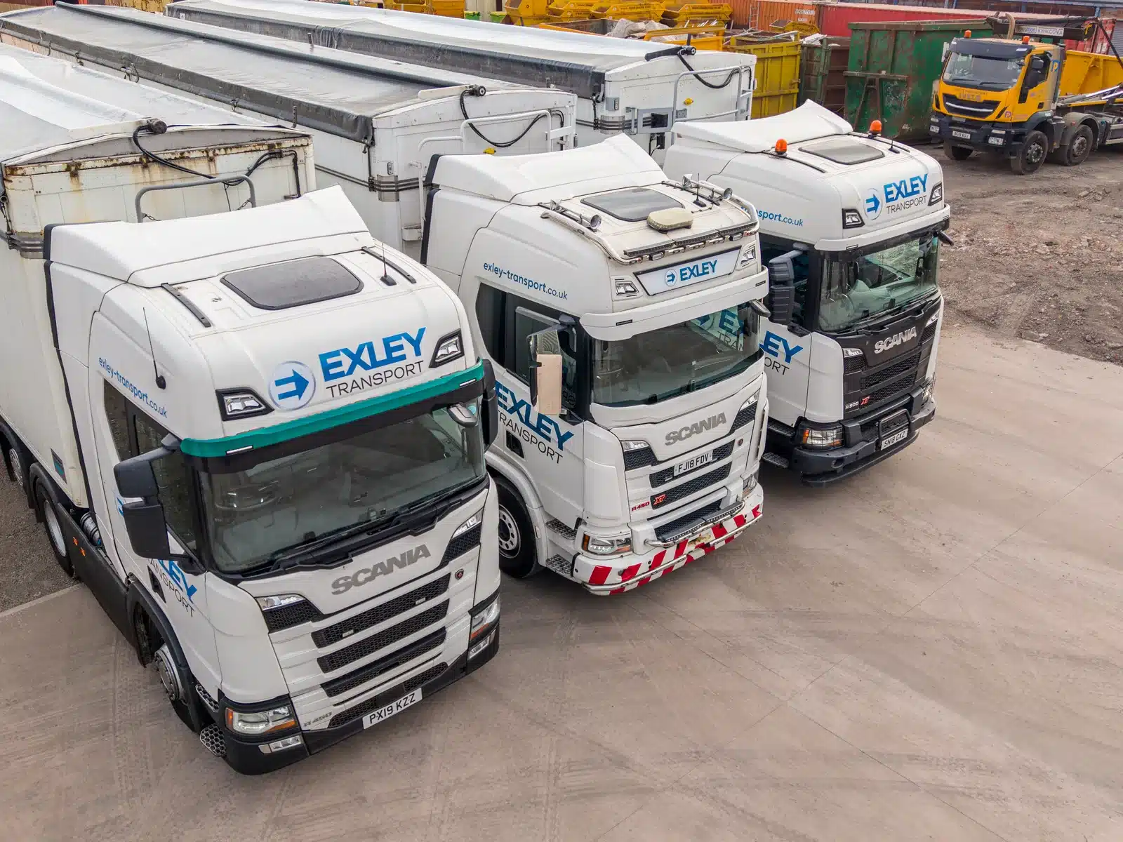 Tractor units lined up in a haulage yard